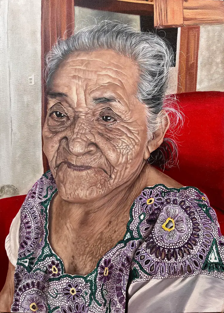 Portrait painting of an older woman with gray hair wearing a patterned purple and green floral garment, seated against a red background