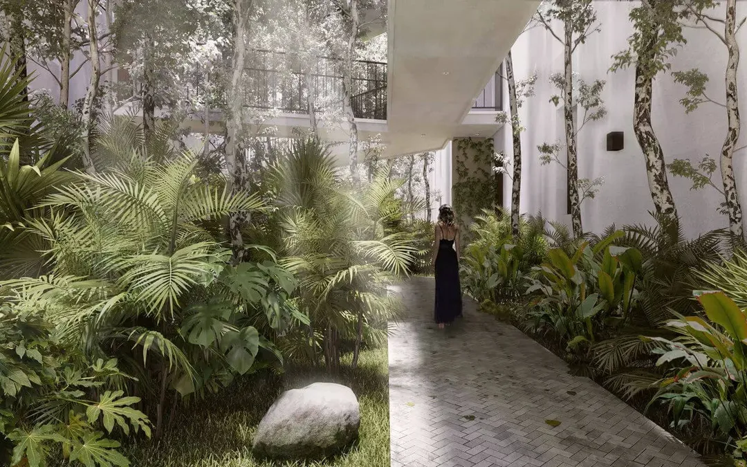 Person in black dress walking through a courtyard garden with tropical plants and white modernist architecture