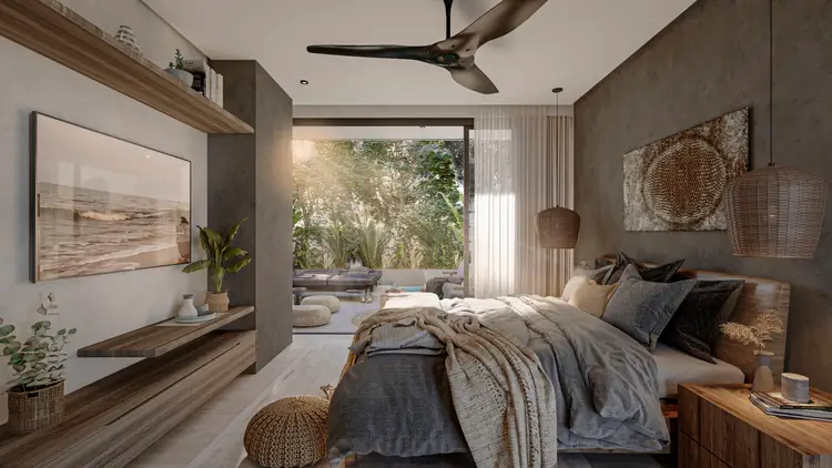 Modern bedroom with large bed, woven pendant lights, and sliding glass doors opening to a garden view with trees and seating area Modern bedroom with large bed, woven pendant lights, and sliding glass doors opening to a garden view with trees and seating area