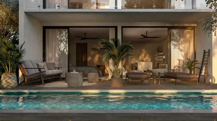 Modern home with large glass sliding doors opens onto a pool deck with lounge seating and potted plants Modern home with large glass sliding doors opens onto a pool deck with lounge seating and potted plants