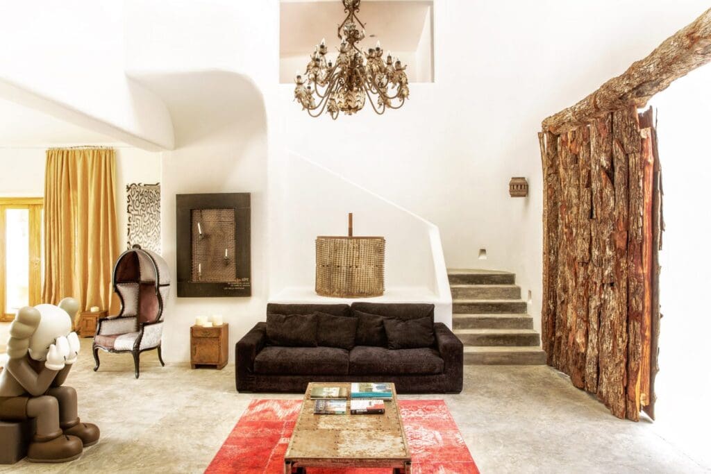 Casa Malca in Tulum, once owned by Pablo Escobar, has been transformed into a luxury hotel by art dealer Lio Malca, blending history, art, and luxury.